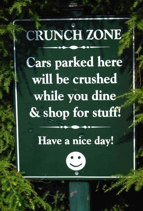 Sign: Crunch Zone (no parking here)