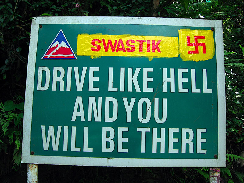 road sign: drive like hell and you will be there