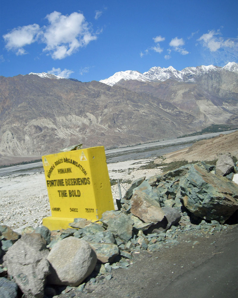 road sign: fortune befriends the bold