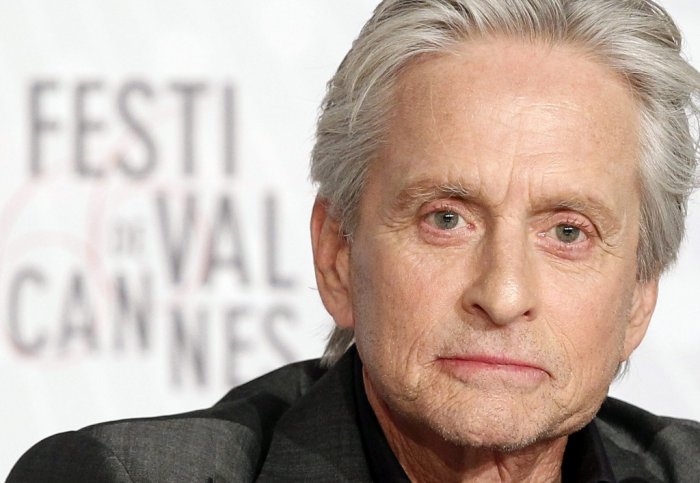 Michael Douglas was working as a refueller at a gas station.